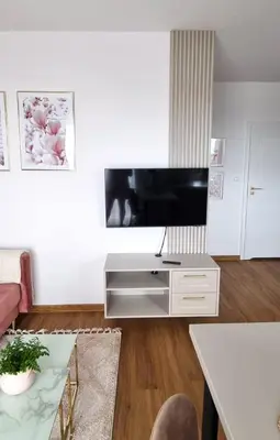 Telewizja i/lub zestaw kina domowego w obiekcie Apartament Magnolia