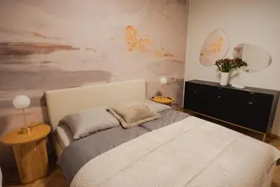 Łóżko lub łóżka w pokoju w obiekcie Gliwice Dickensa 36A Condo