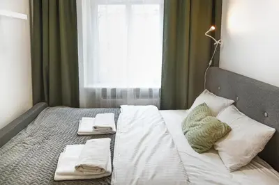 Łóżko lub łóżka w pokoju w obiekcie Wyjątkowe apartamenty w Centrum