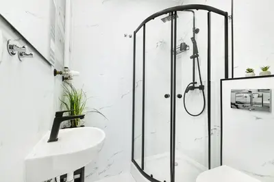 Łazienka w obiekcie Wyjątkowe apartamenty w Centrum
