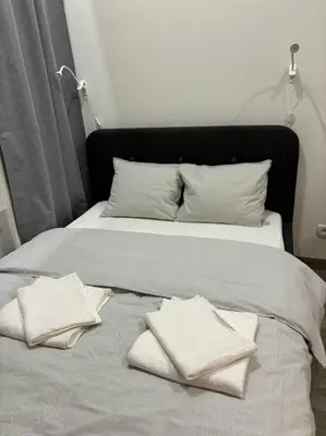Łóżko lub łóżka w pokoju w obiekcie Wyjątkowe apartamenty w Centrum