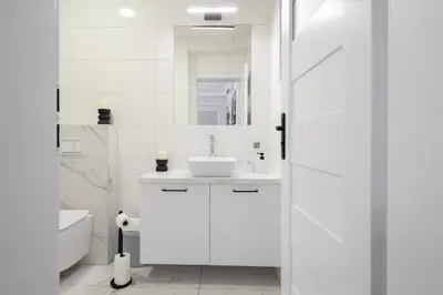 Łazienka w obiekcie Apartamenty Różane