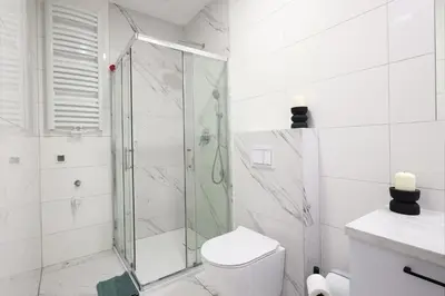 Łazienka w obiekcie Apartamenty Różane