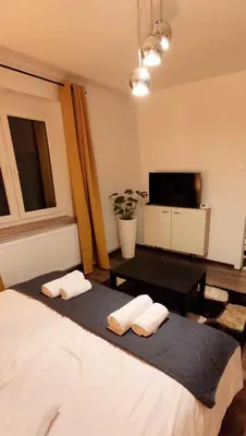 Łóżko lub łóżka w pokoju w obiekcie Apartament na Poli