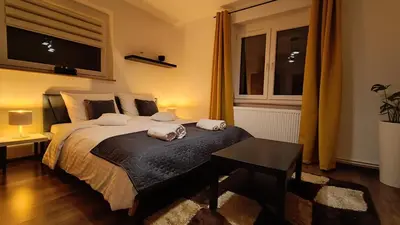 Łóżko lub łóżka w pokoju w obiekcie Apartament na Poli