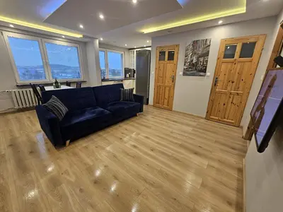 Część wypoczynkowa w obiekcie City Sense - Apartament z widokiem na góry i miasto