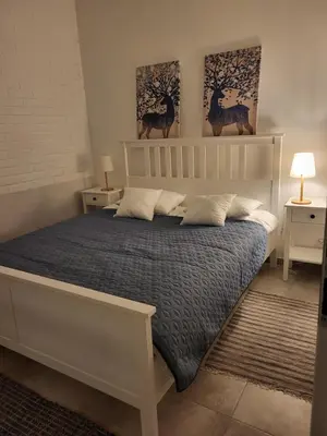 Łóżko lub łóżka w pokoju w obiekcie Apartament Prestiż