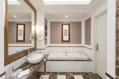 Łóżko lub łóżka w pokoju w obiekcie Hotel SPA Dr Irena Eris Polanica Zdrój