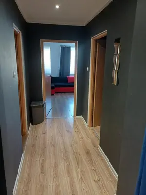 Łóżko lub łóżka w pokoju w obiekcie Apartament-Zaodrze,2- pokoje,kuchnia,łazienka