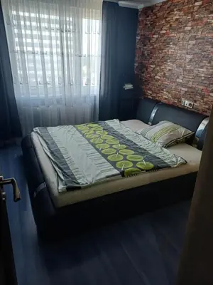 Łóżko lub łóżka w pokoju w obiekcie Apartament pod chmurami 2 pokoje
