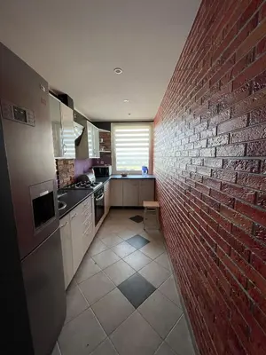 Kuchnia lub aneks kuchenny w obiekcie Apartament pod chmurami 2 pokoje