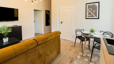 Telewizja i/lub zestaw kina domowego w obiekcie VacationClub - Old Town Apartament 8B