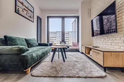 Część wypoczynkowa w obiekcie RentPlanet - Apartament Wyszyńskiego