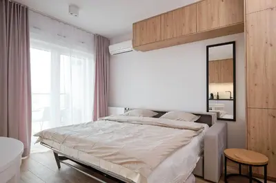 Łóżko lub łóżka w pokoju w obiekcie Studio nad rzeką 72, Rynek 500 m