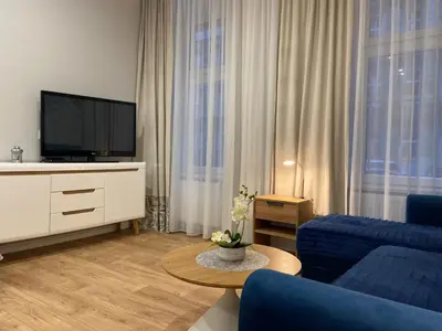 Telewizja i/lub zestaw kina domowego w obiekcie Apartament na Przedmieściu by Apartamenty na dni Wrocław