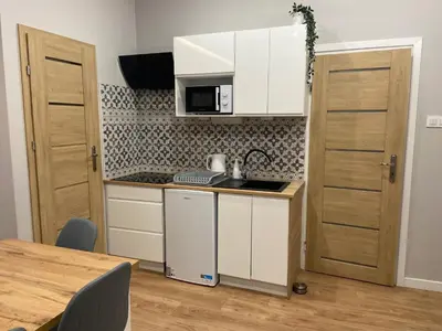 Kuchnia lub aneks kuchenny w obiekcie Apartament na Przedmieściu by Apartamenty na dni Wrocław