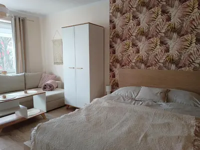 Łóżko lub łóżka w pokoju w obiekcie Apartament w Srebrnym Mieście
