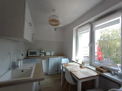 Kuchnia lub aneks kuchenny w obiekcie Apartament w Srebrnym Mieście