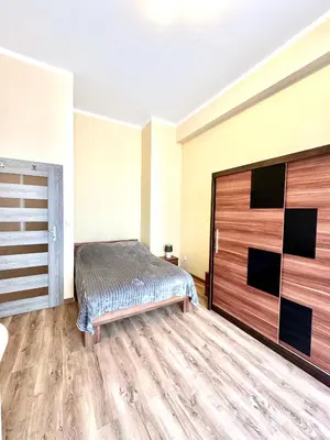 Łóżko lub łóżka w pokoju w obiekcie Centrum Legnicy - Złotego Florena
