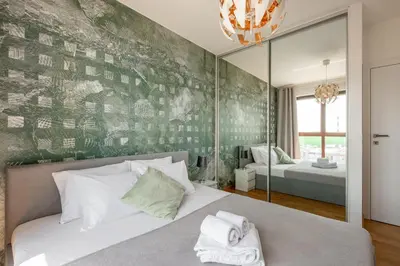 Łóżko lub łóżka w pokoju w obiekcie Comfort Apartment Podwale City Centre