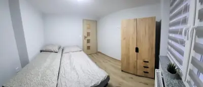 Łóżko lub łóżka w pokoju w obiekcie ApartHotel8