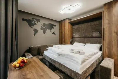Łóżko lub łóżka w pokoju w obiekcie Apartament 4a Park City