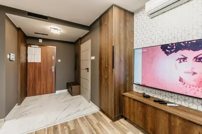 Telewizja i/lub zestaw kina domowego w obiekcie Apartament 4a Park City