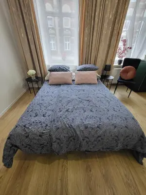 Łóżko lub łóżka w pokoju w obiekcie Apartament -Studio 3 Gliwice