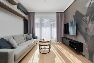 Telewizja i/lub zestaw kina domowego w obiekcie Białowieska 69 - Ekskluzywny apartament w Porcie Popowice z parkingiem i balkonem - Wrocław - Fair Rentals