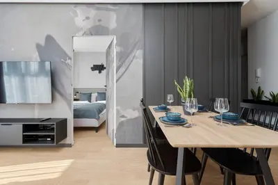 Część wypoczynkowa w obiekcie Białowieska 69 - Ekskluzywny apartament w Porcie Popowice z parkingiem i balkonem - Wrocław - Fair Rentals