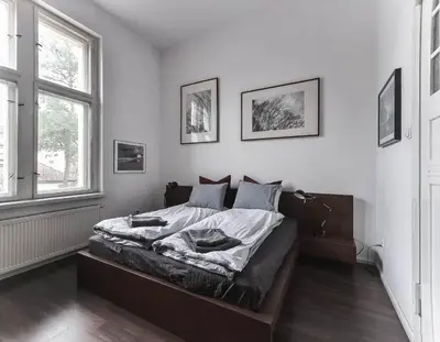 Łóżko lub łóżka w pokoju w obiekcie Stylowy Park Apartment Wawrzyniaka