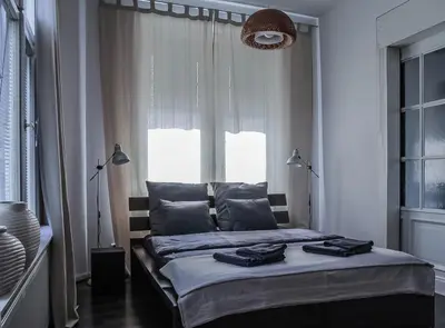 Łóżko lub łóżka w pokoju w obiekcie Stylowy Park Apartment Wawrzyniaka