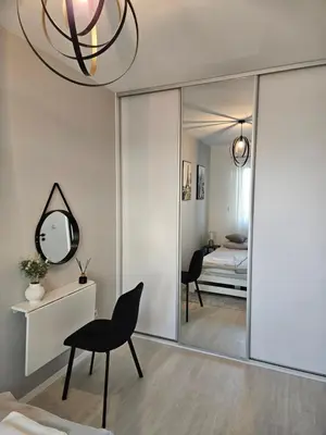 Łóżko lub łóżka w pokoju w obiekcie Apartament - Osiedle Przylesie