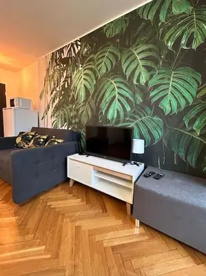 Telewizja i/lub zestaw kina domowego w obiekcie Klimatyczne gniazdko przy Rynku