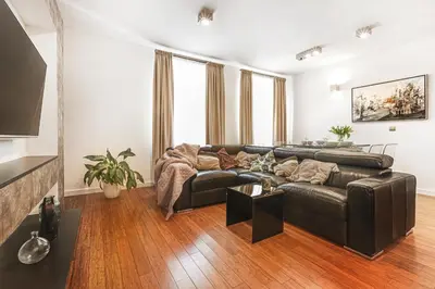 Część wypoczynkowa w obiekcie Apartament z Jacuzzi Parking Balkon 2 sypialnie