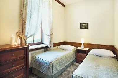 Łóżko lub łóżka w pokoju w obiekcie Słoneczna Willa