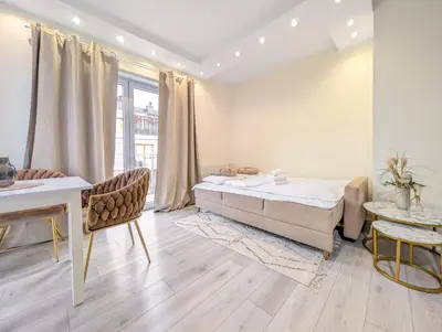 Łóżko lub łóżka w pokoju w obiekcie Kościańska Cosy Apartment by BookingHost