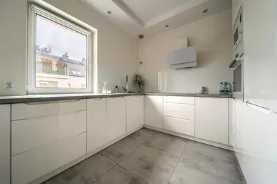 Kuchnia lub aneks kuchenny w obiekcie Kościańska Cosy Apartment by BookingHost