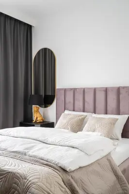 Łóżko lub łóżka w pokoju w obiekcie RentPlanet - Legnicka Residence