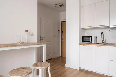 Kuchnia lub aneks kuchenny w obiekcie RentPlanet - Legnicka Residence
