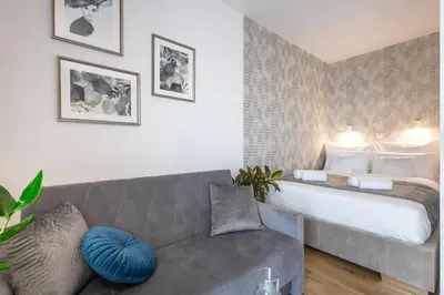 Łóżko lub łóżka w pokoju w obiekcie Jaworska 4 Apartments Wrocław