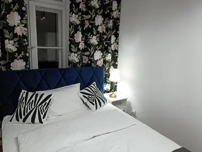 Łóżko lub łóżka w pokoju w obiekcie Tabago Studio 16