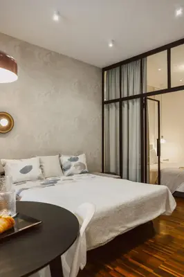 Łóżko lub łóżka w pokoju w obiekcie Elegancki apartament od dziedzińca, 60m2, parking, Rynek 700 m