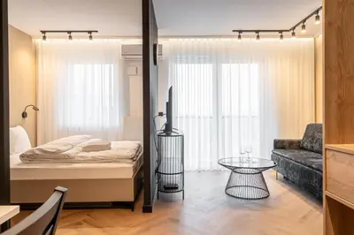 Łóżko lub łóżka w pokoju w obiekcie RentPlanet - Browary Wrocławskie