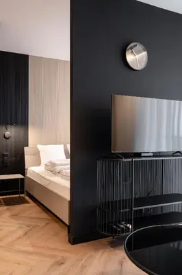 Łóżko lub łóżka w pokoju w obiekcie RentPlanet - Browary Wrocławskie