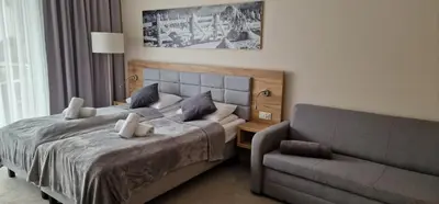 Łóżko lub łóżka w pokoju w obiekcie Apartament Czarna Góra MOON