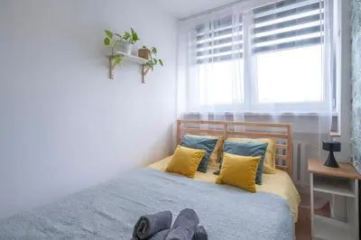 Łóżko lub łóżka w pokoju w obiekcie Verde Apartment SelfCheck-in 24h