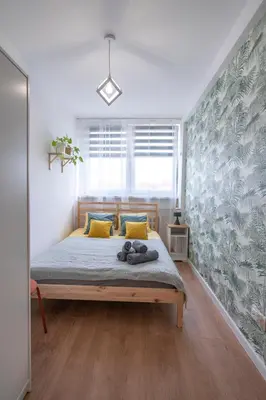 Łóżko lub łóżka w pokoju w obiekcie Verde Apartment SelfCheck-in 24h
