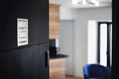 Telewizja i/lub zestaw kina domowego w obiekcie ApartHouse Piwna 14