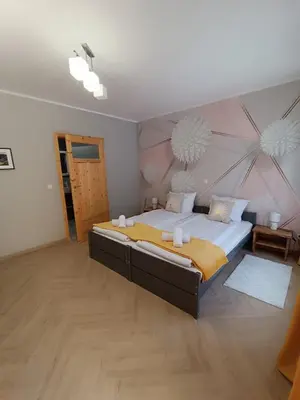 Łóżko lub łóżka w pokoju w obiekcie Pokoje u Daniela